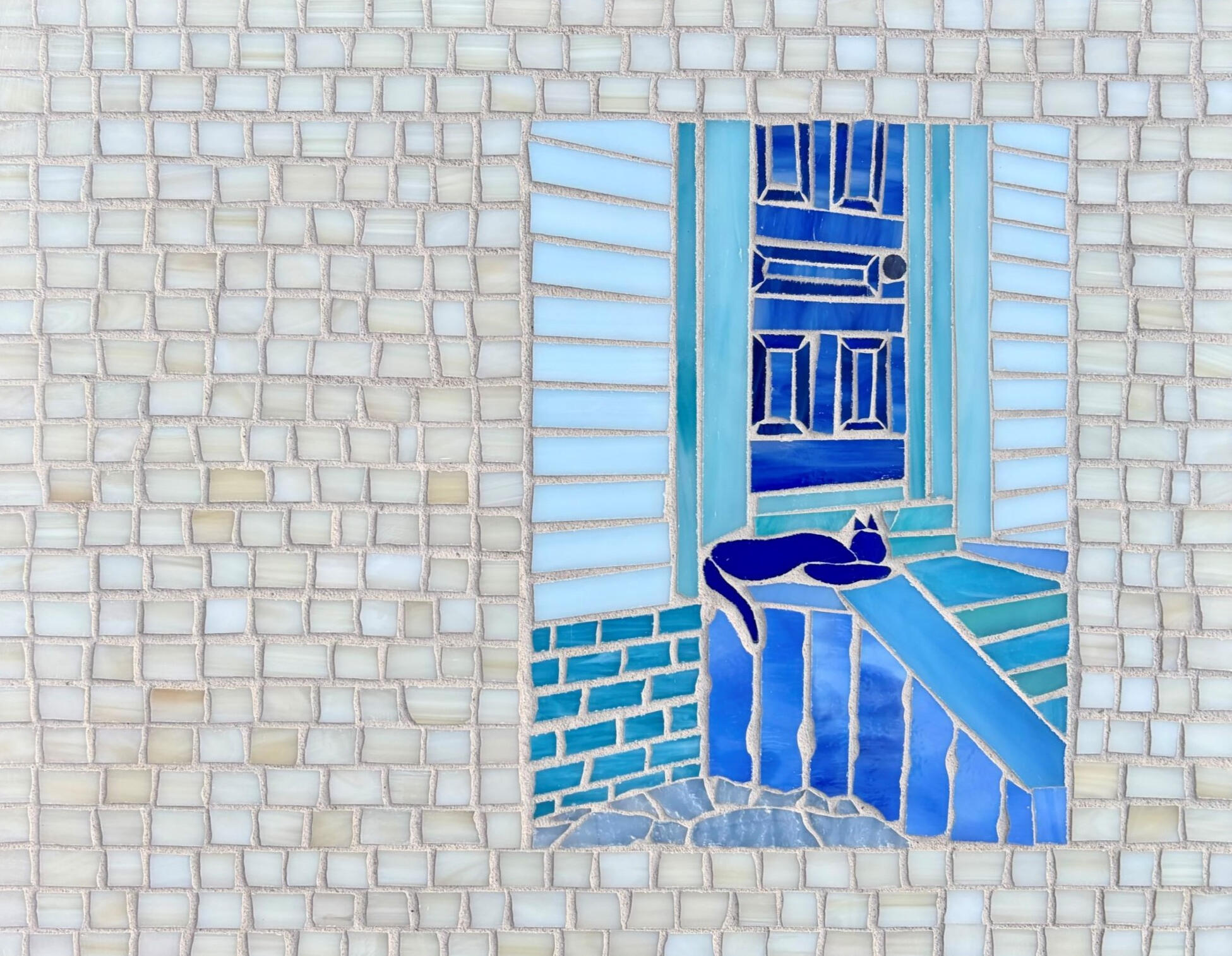 cat on stairs mosaic